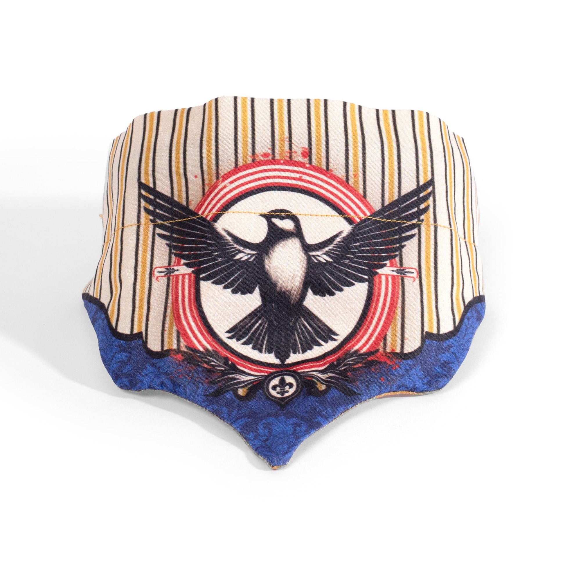 Gold striped cat and dog bandana with a blue yoke design and a red and black emblem of a bird