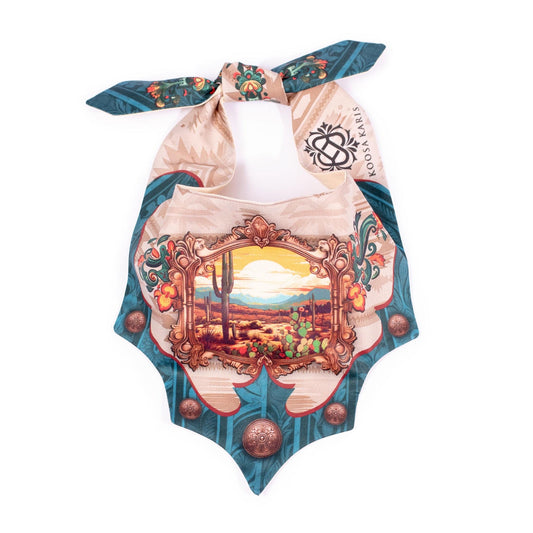 Beige and teal dog bandana with a desert sunset scene