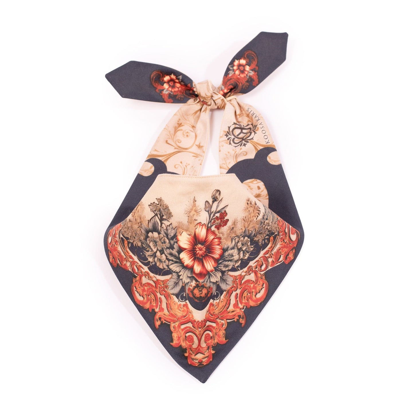 Beige dog bandana with a navy, orange and gold paisley floral pattern 