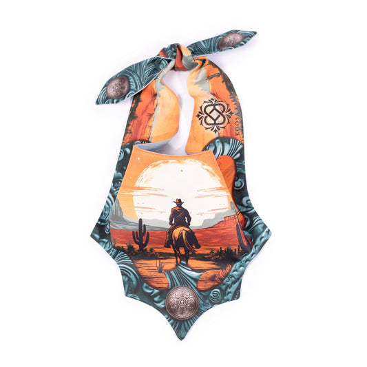 Turquoise colored western style dog bandana with a cowboy riding horse into the sunset