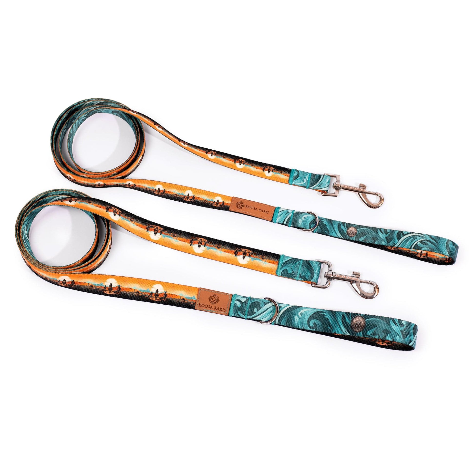 Dog leashes with silver-toned hardware and a sunset and cowboy pattern design and western style  turquoise colored ends 